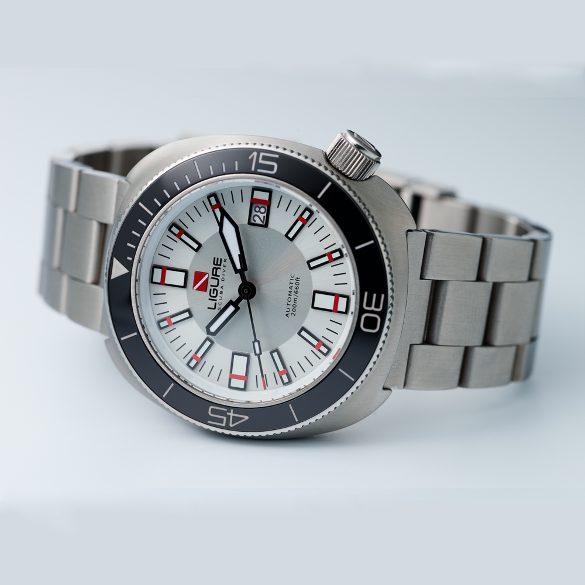 Sunlit Silver dial with stainless steel bracelet showing the refined sunburst finish