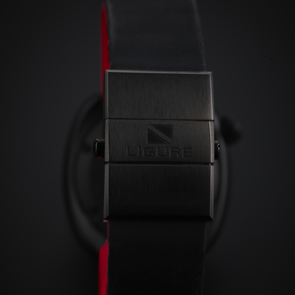 Black Nero di Seppia watch strap with 'LIGURE' branding on a dark background